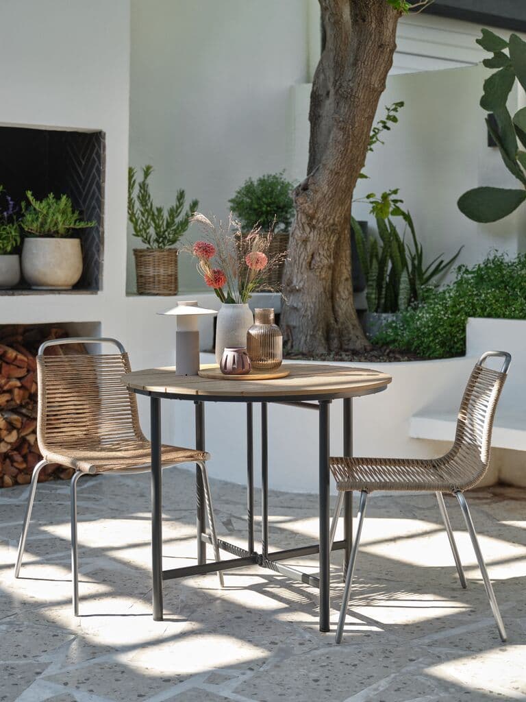 Mesa de jardín redonda de madera natural HOVVIG