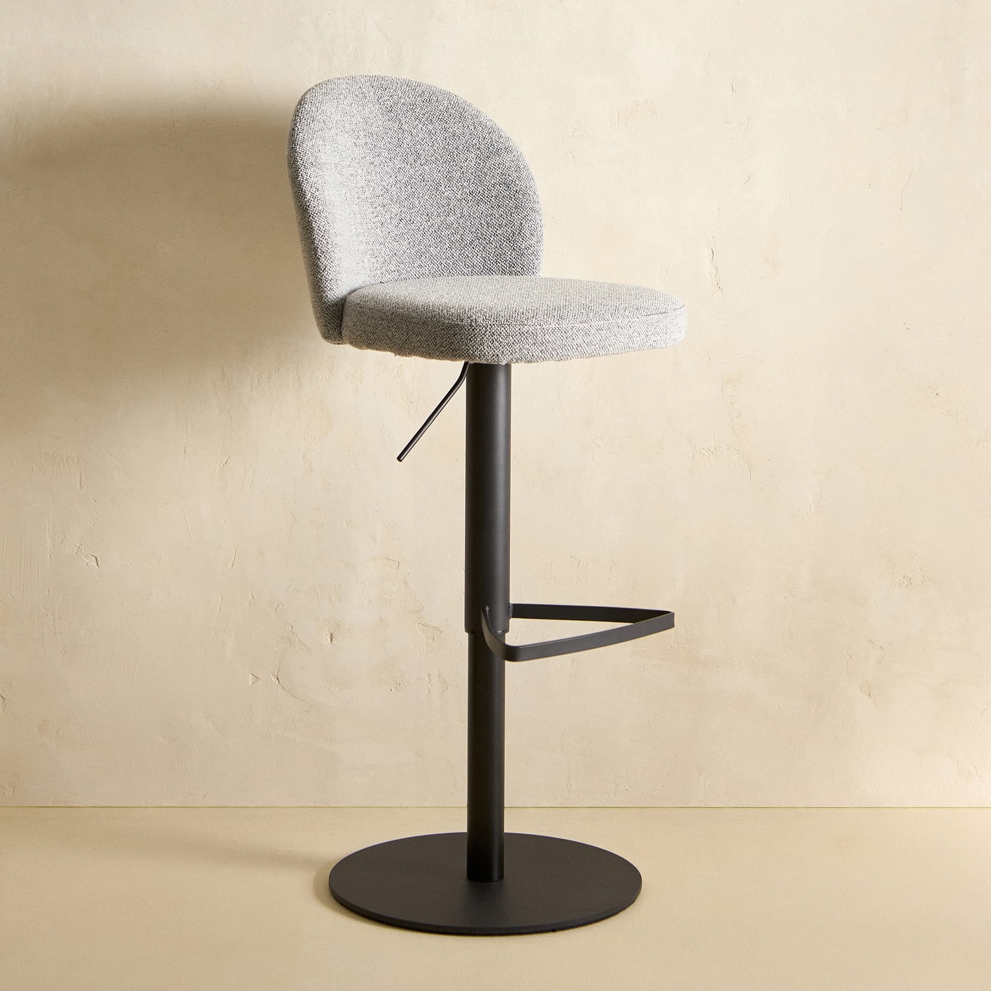Taburete elevable tapizado gris Toby
