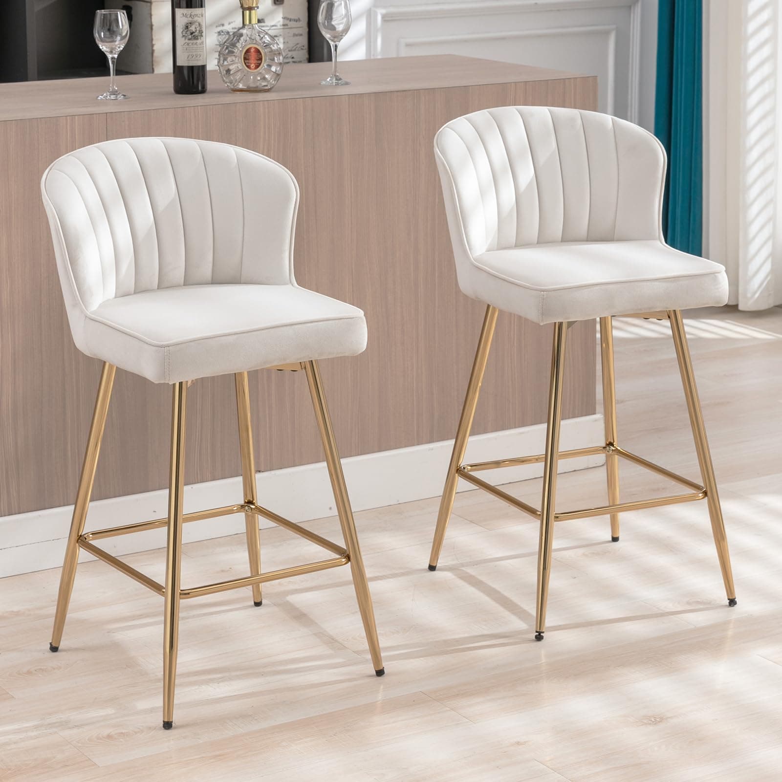 Taburete alto tapizado blanco con patas doradas