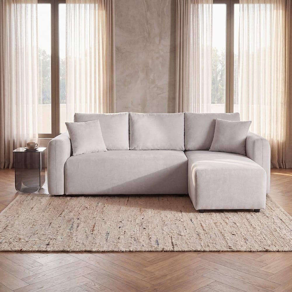 Sofá cama beige de 4 plazas con chaise longue