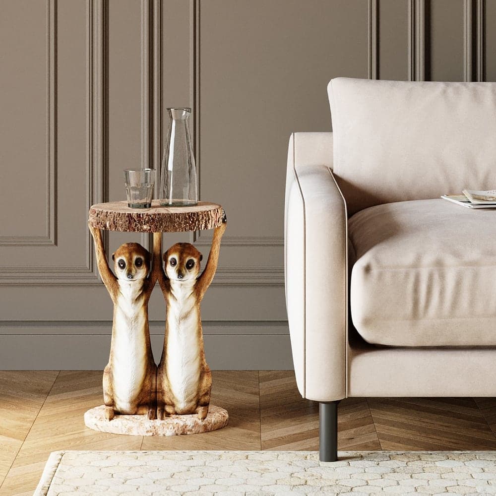 Mesa auxiliar decorativa con figuras de suricatas