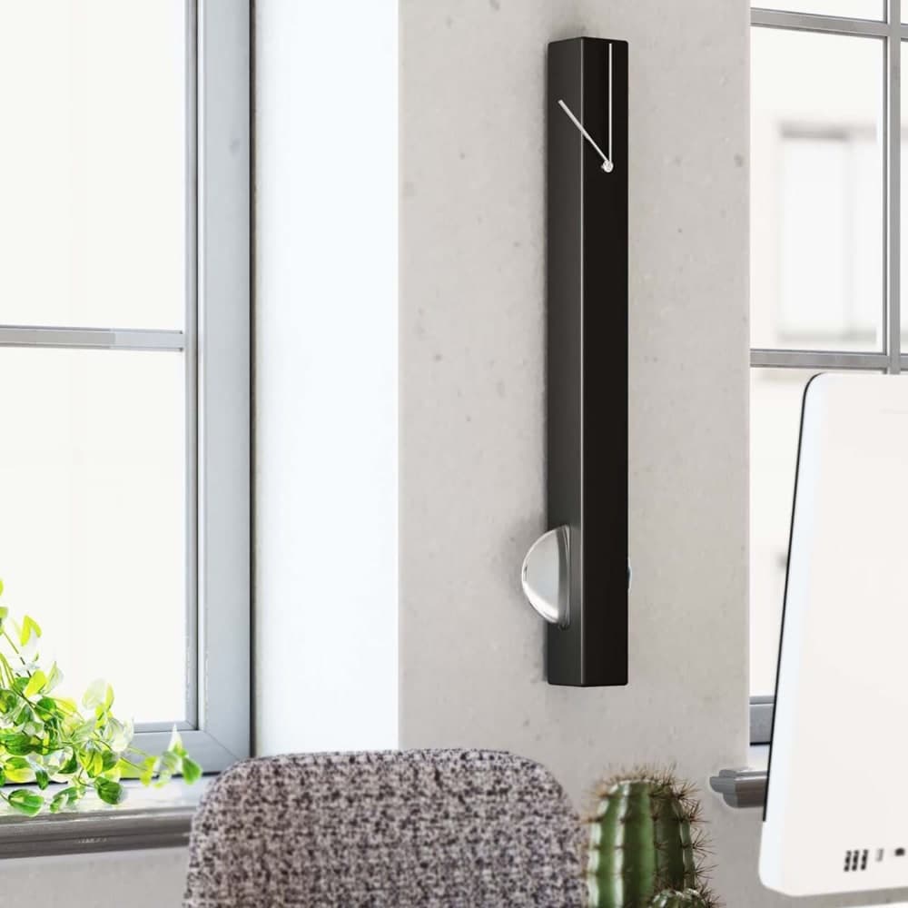 Reloj de pared con péndulo minimalista negro