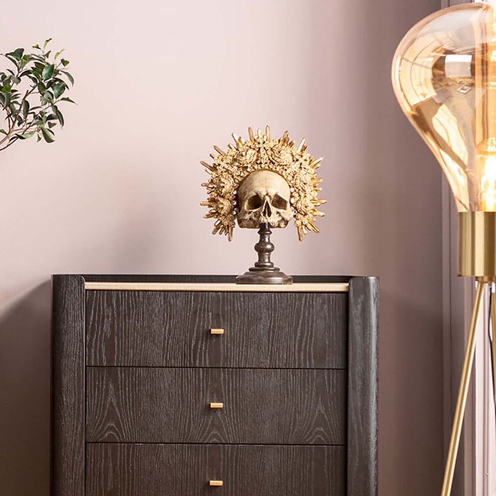figura calavera decorativa, objeto decorativo dorado