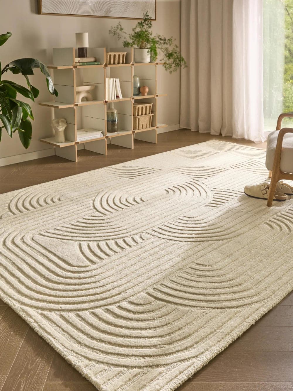 Alfombra de lana crema con relieve geométrico
