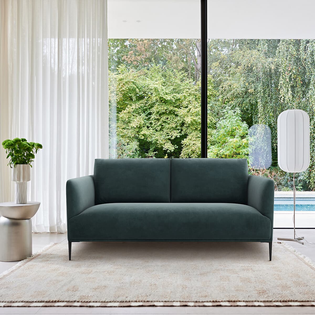 Sofá moderno de terciopelo verde oscuro