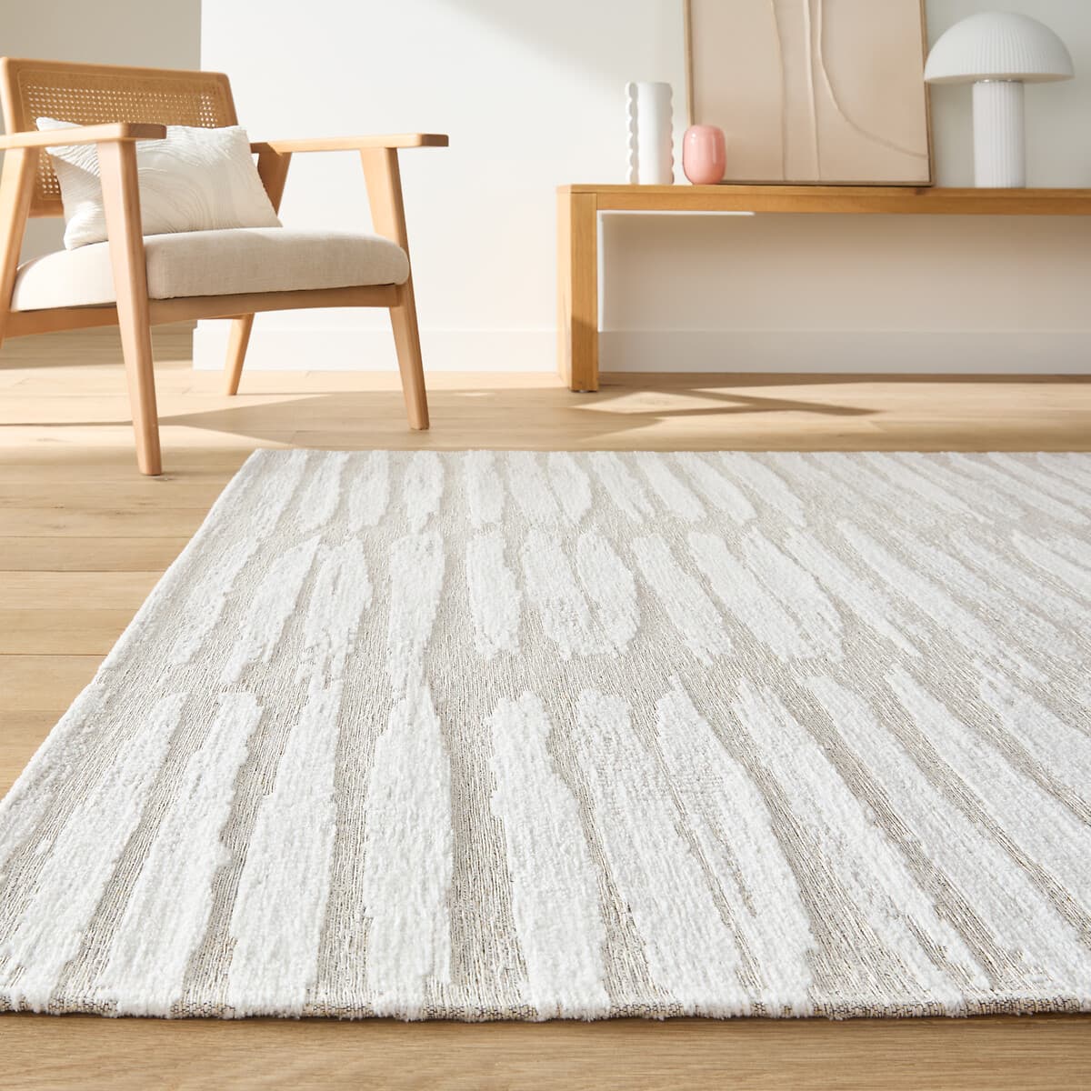 Alfombra de lana con diseño abstracto en blanco y beige