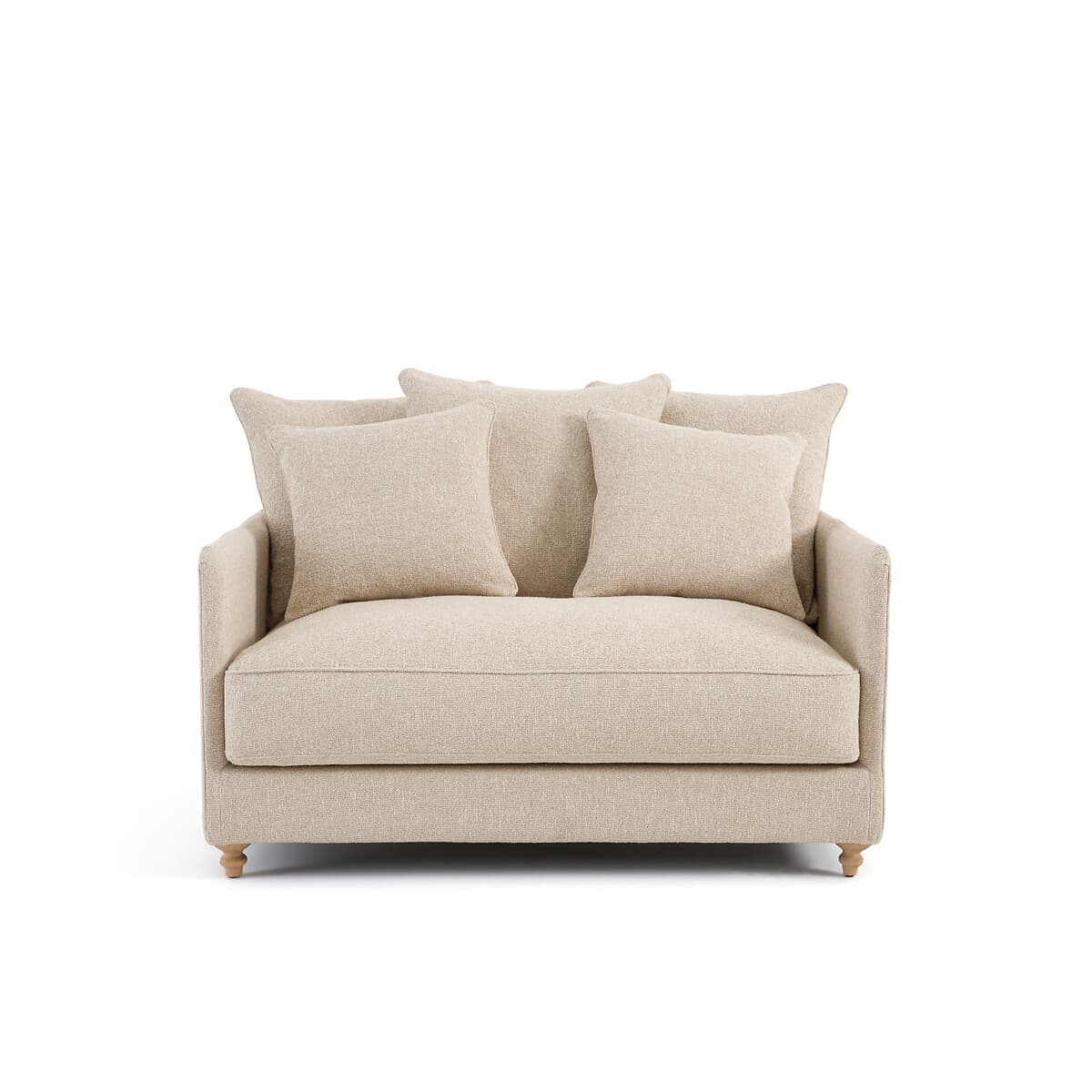 Sillón tapizado beige con cojines
