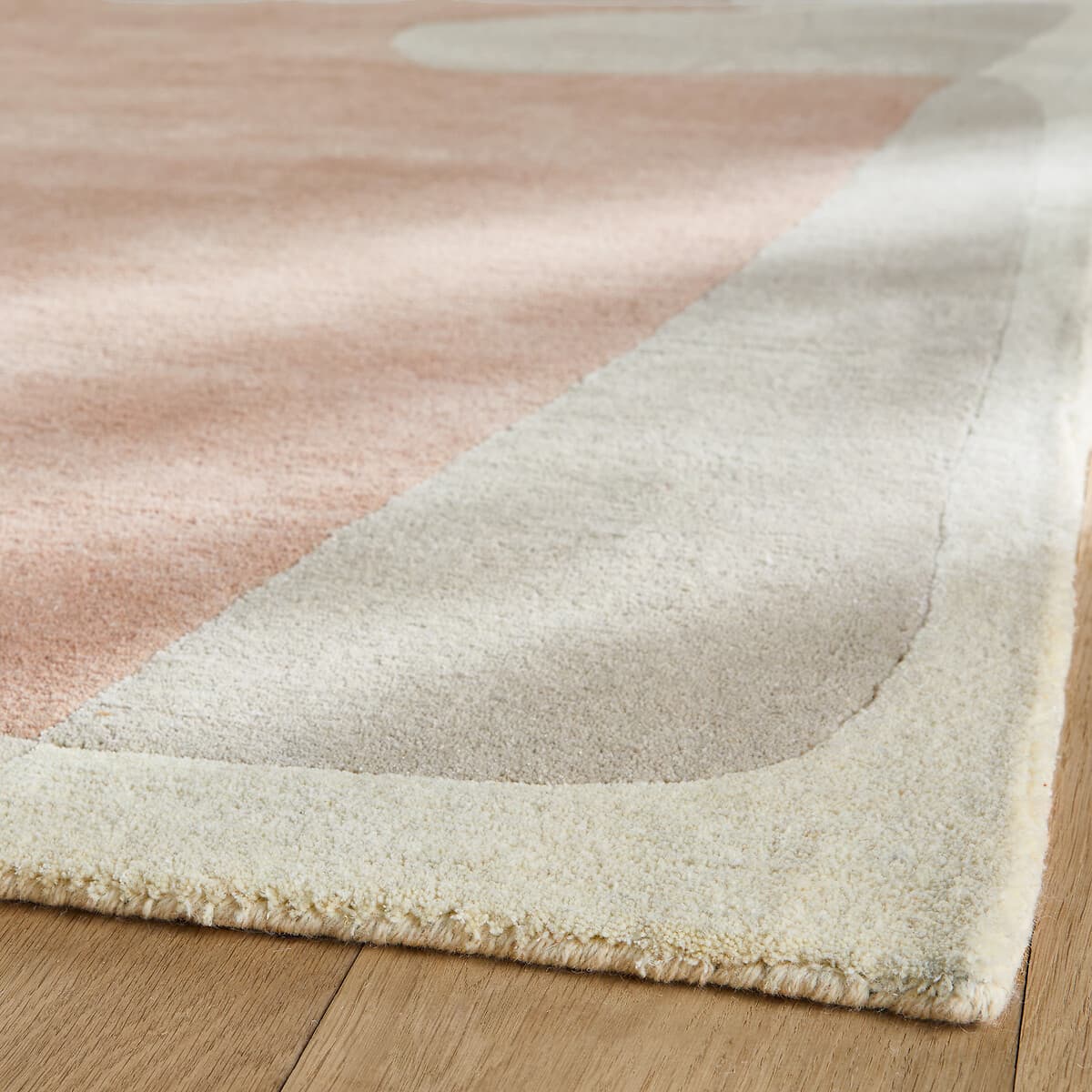 alfombra diseño geométrico, alfombra lana rosa pastel