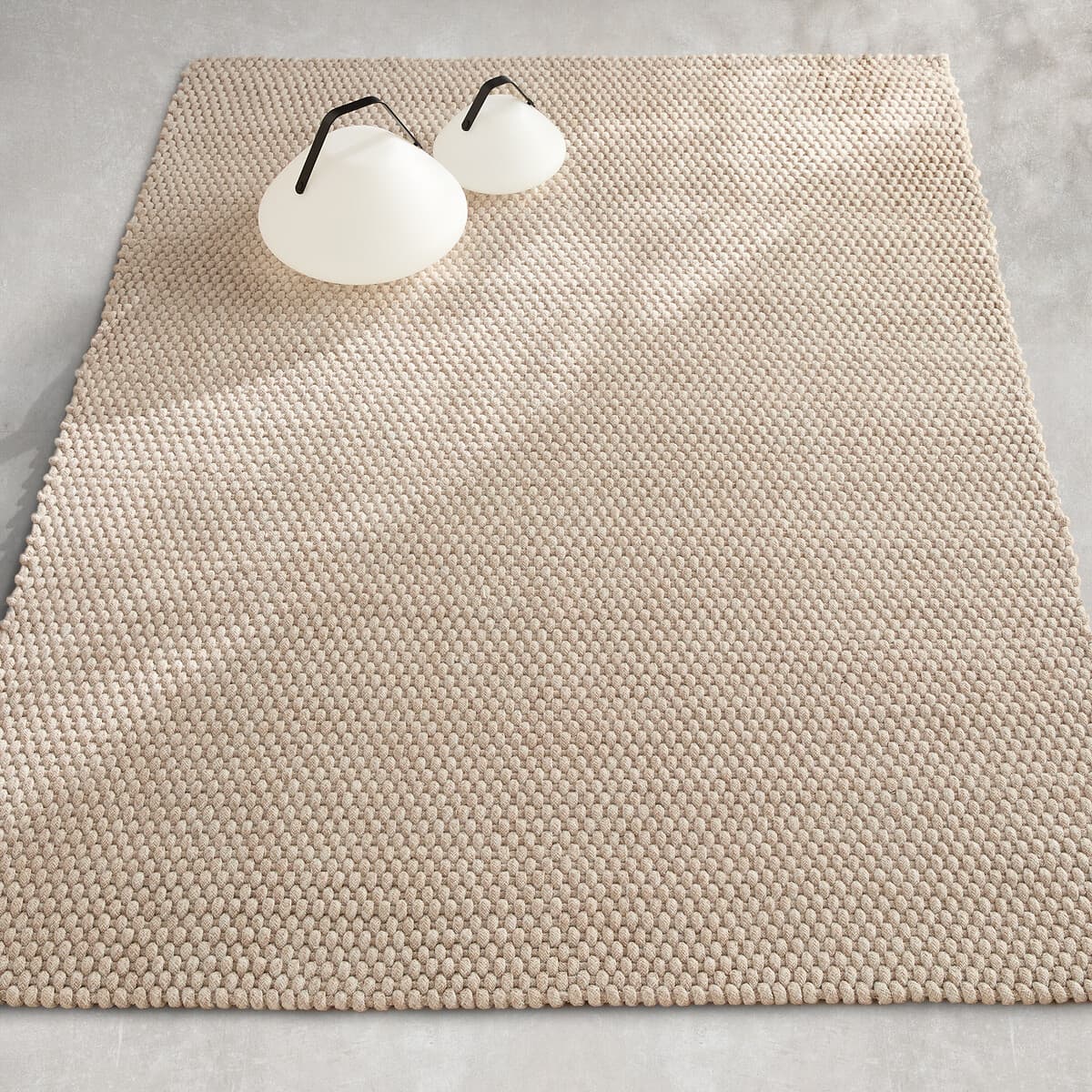 Alfombra de lana con textura beige