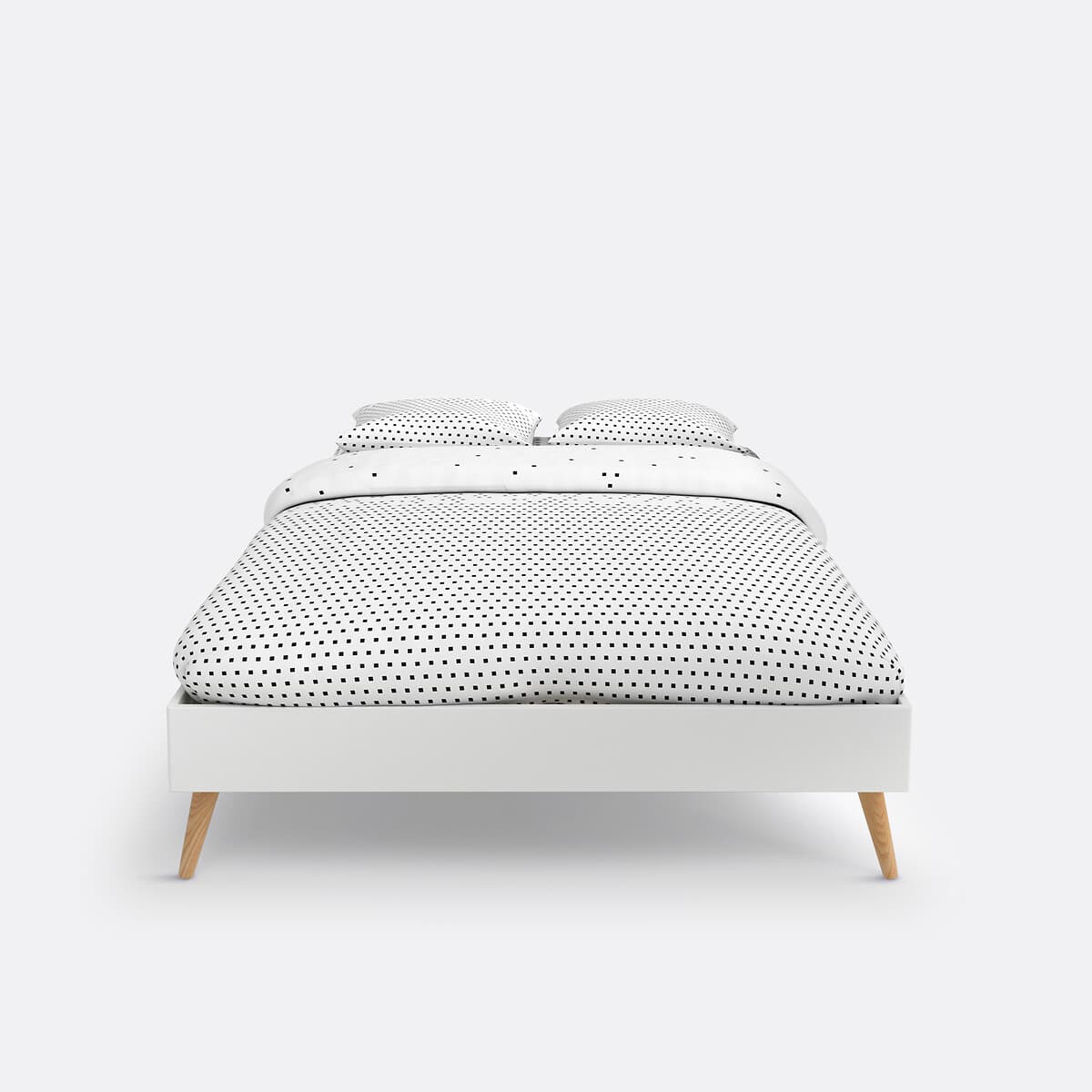 Cama blanca con patas de madera estilo nórdico