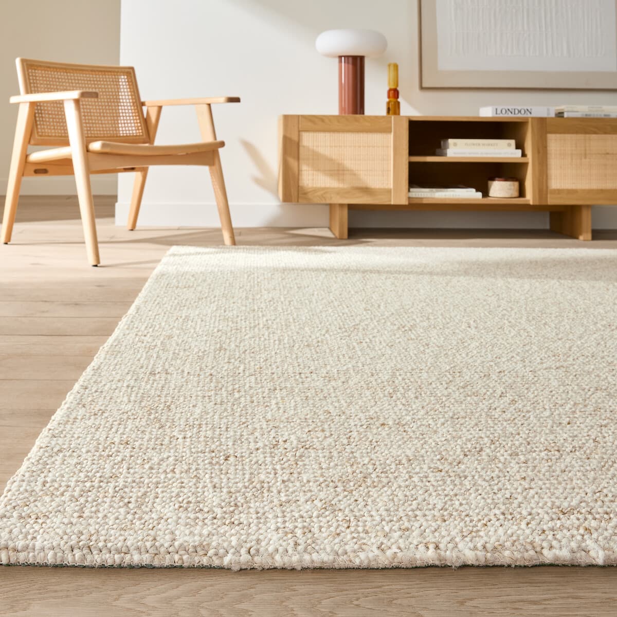 Alfombra de lana bouclé color crema