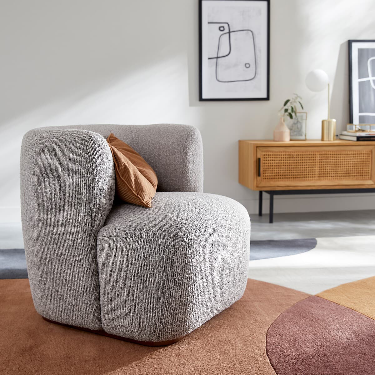 Sillón modular tapizado en bouclé gris