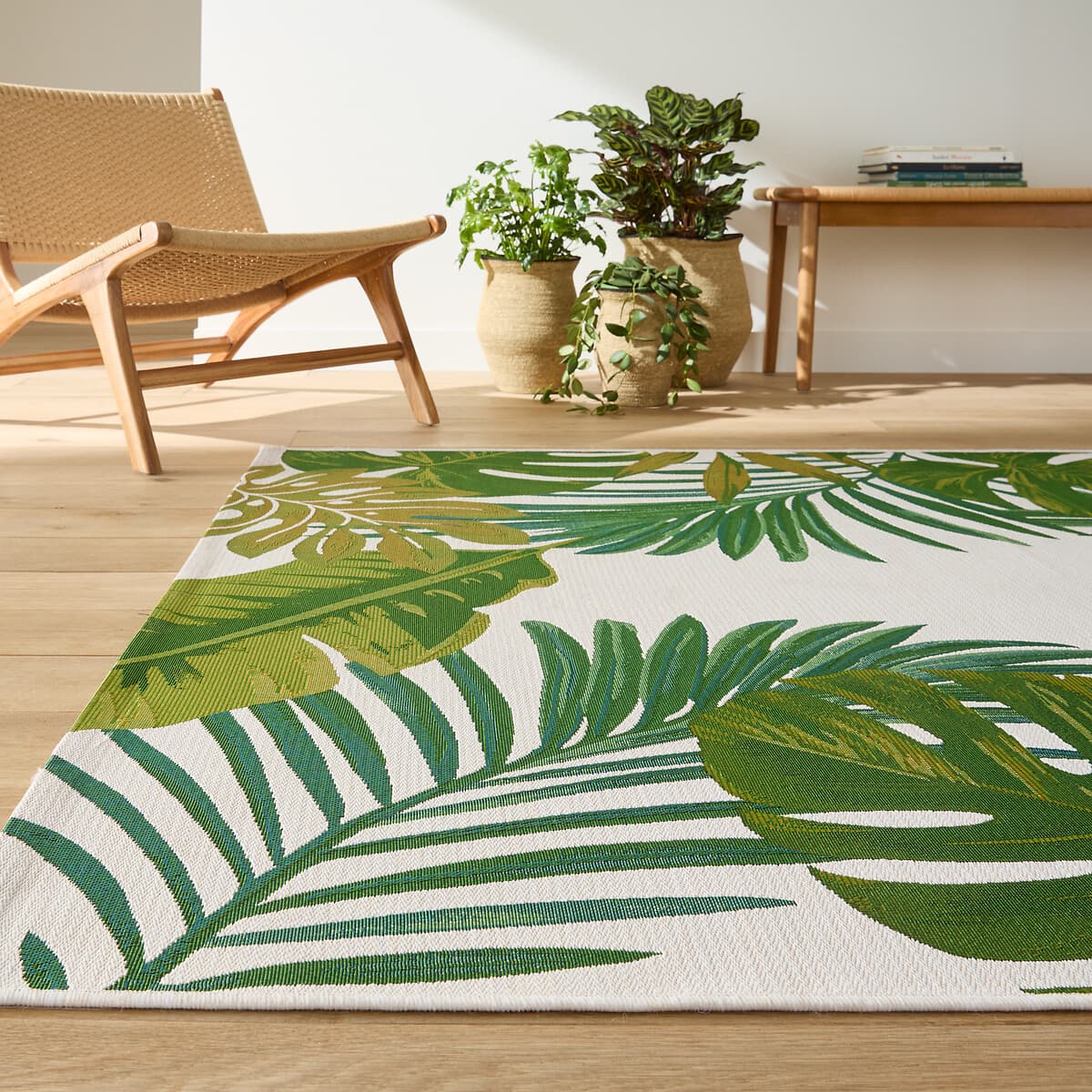 Alfombra de exterior con estampado de hojas tropicales