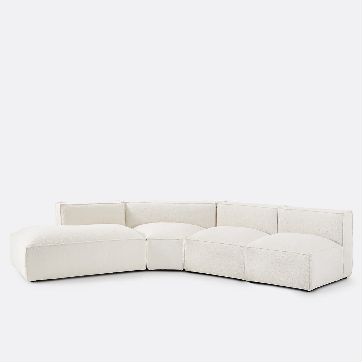 Sofá modular esquinero tapizado en bouclé blanco
