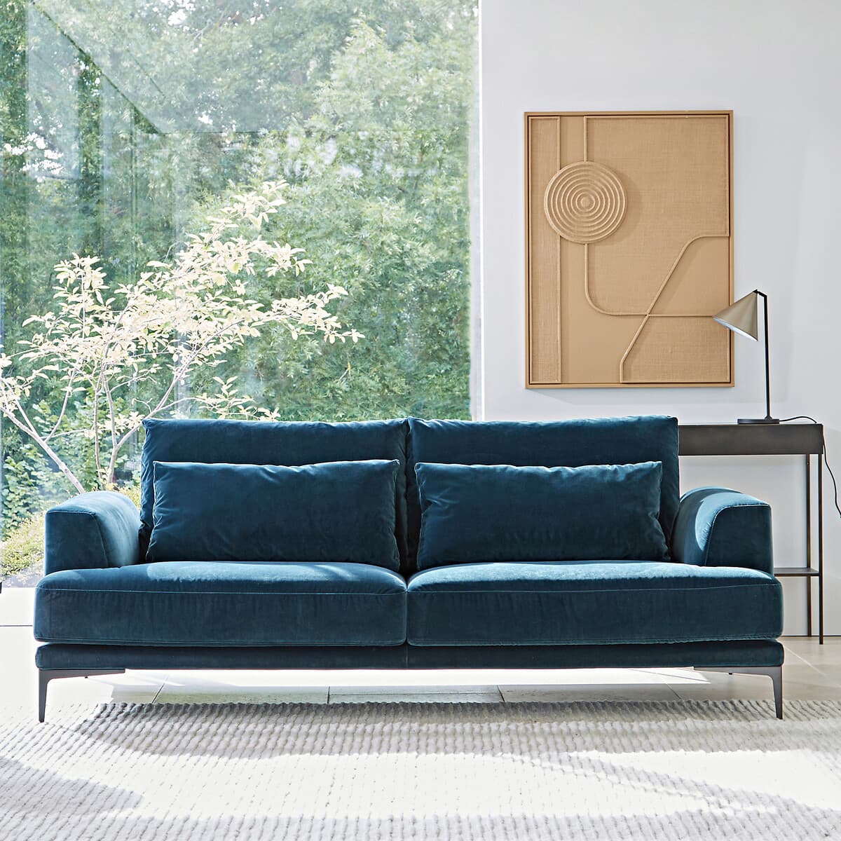 Sofá de terciopelo azul petróleo