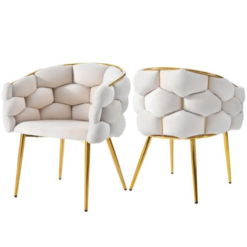 Sillón tapizado blanco con estructura dorada