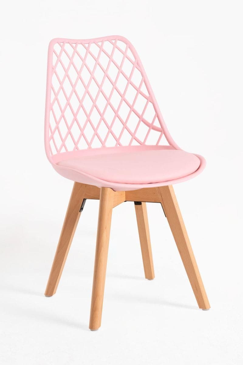 Silla de comedor rosa con asiento tapizado y patas de madera