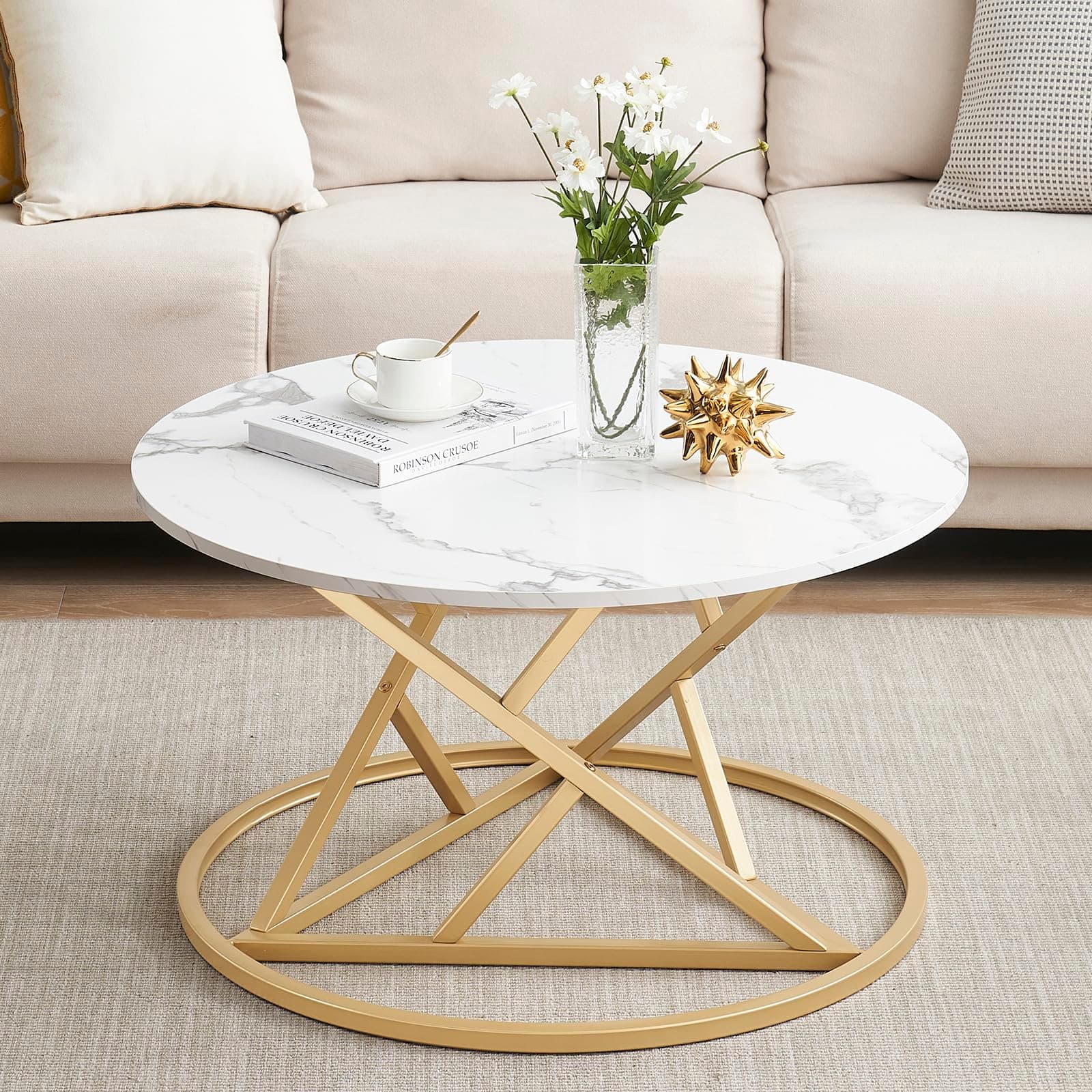 Mesa de centro redonda con tapa de mármol blanco y base dorada